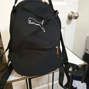 Puma Nylon sling bag..backpack straps and w/handles